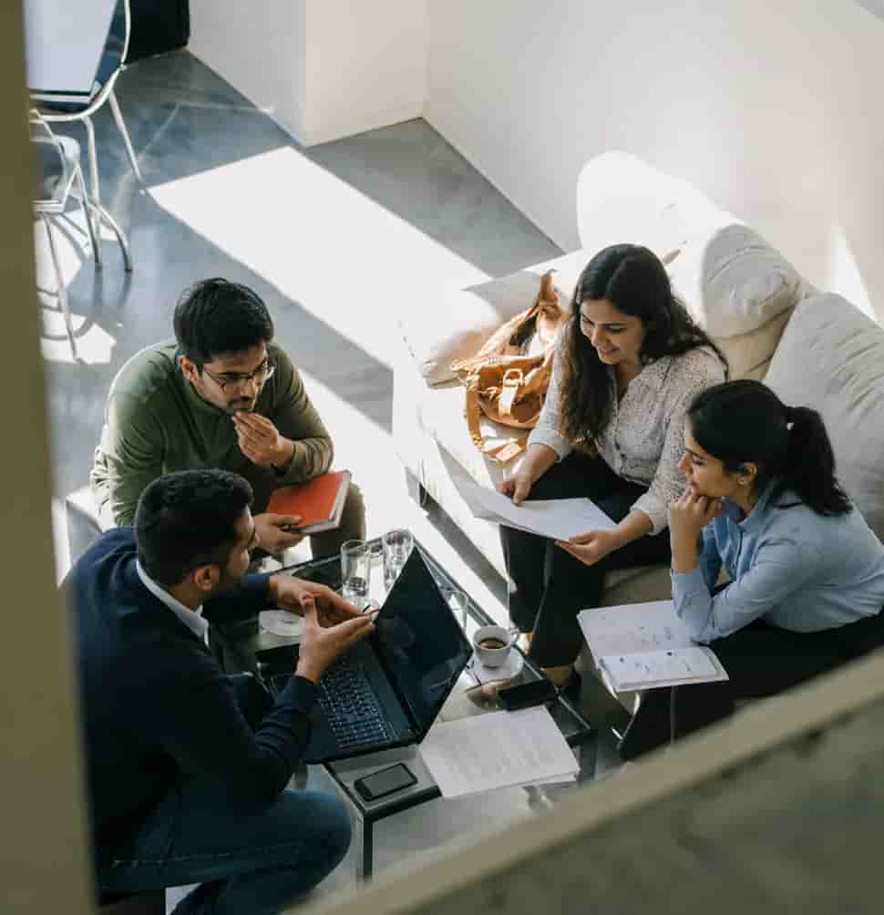 InVenire colleagues working together around a table.
