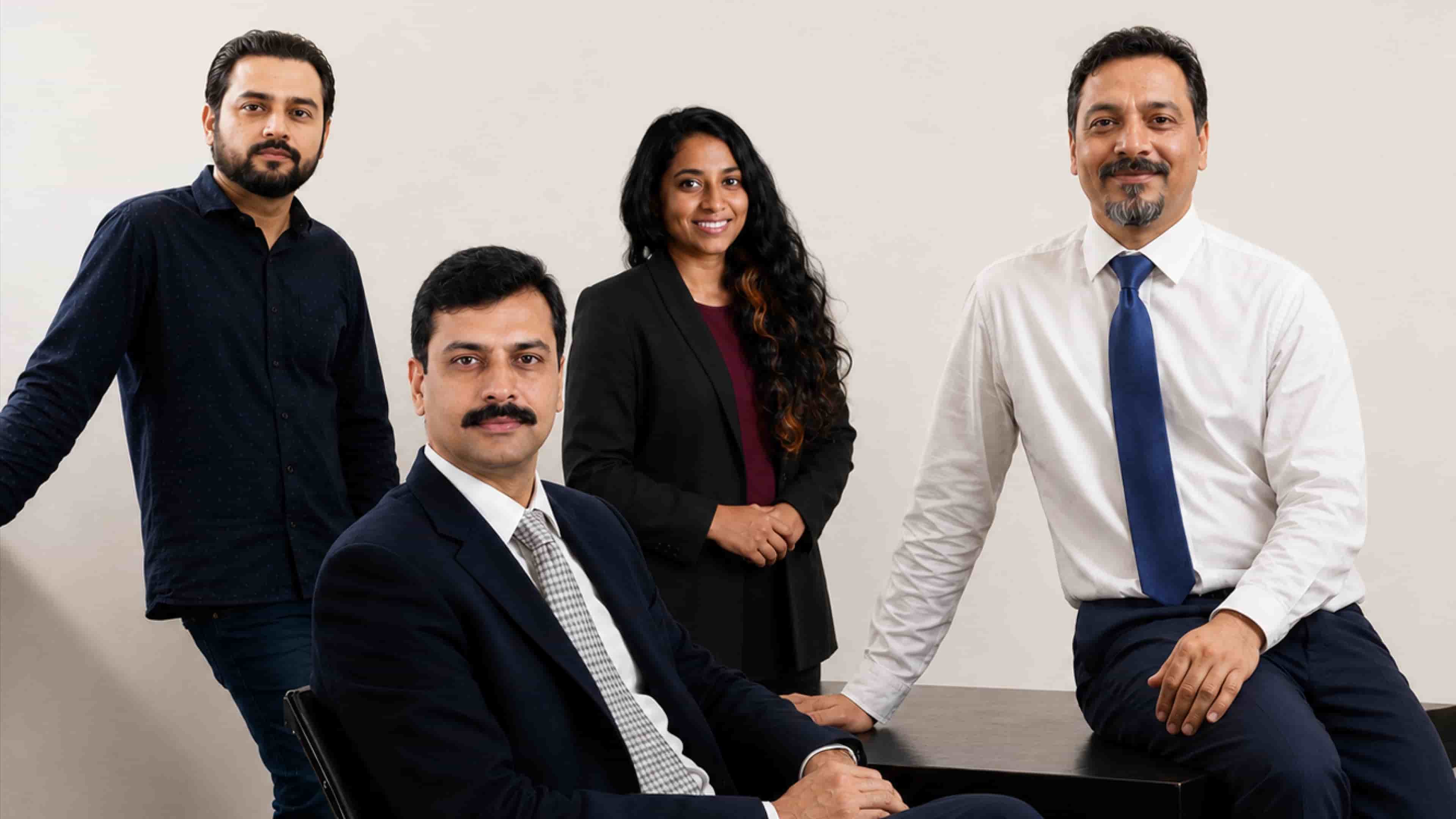 Four members of the InVenire team gathered for a group portrait.